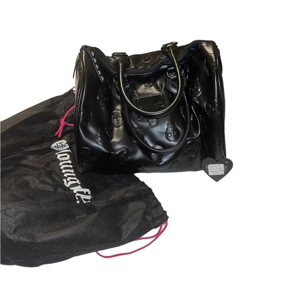Loungefly Handbags - NWT Loungefly Patent Leather Skull Embossed Handbag 💀🖤🤍